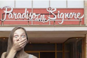 Paradiso delle signore insegna e donna stupita